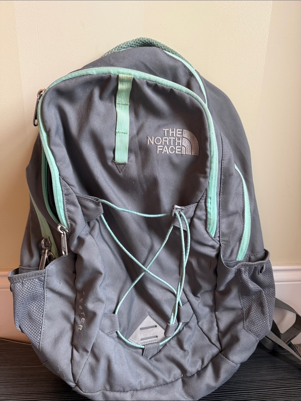 The North Face Jester Gray Backpack with Mint Green Accents